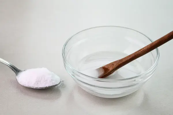 mixing baking soda with water to create a paste that alleviates itching from mosquito bites